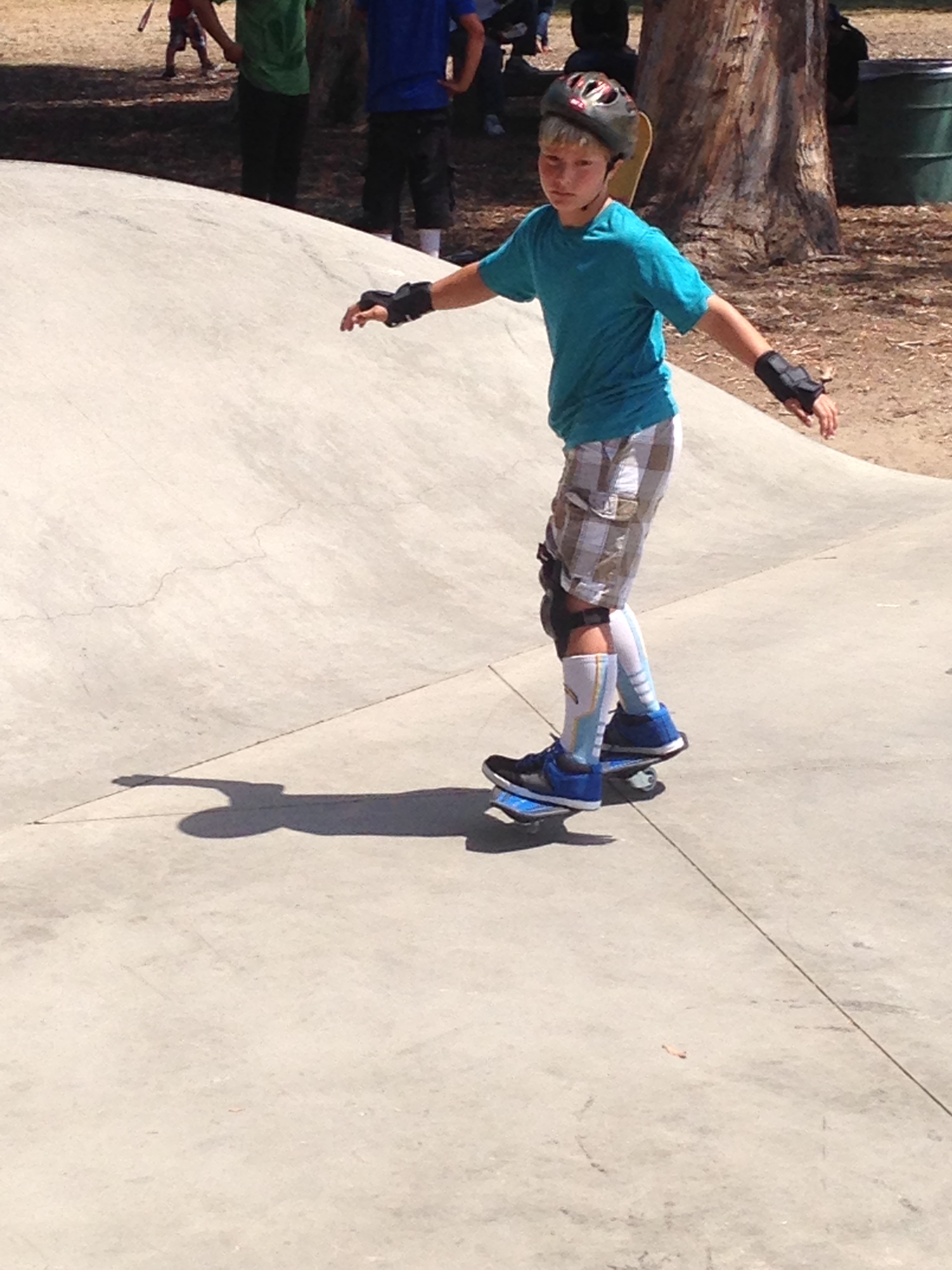 Riding a Ripstik at the Skate Park.