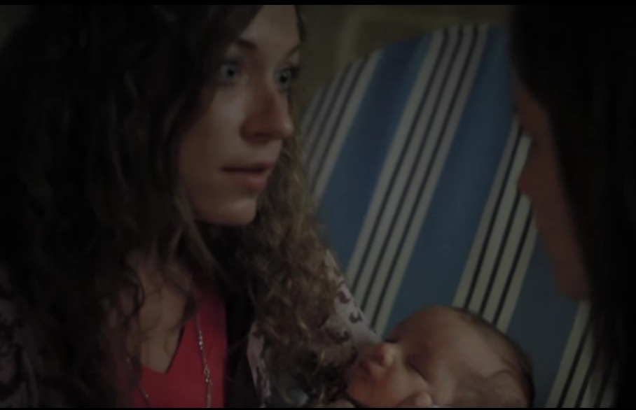 Svetlana Litvinchuk as Lana with Brytnee Ratledge as Lucy and Leander Wartes-Hernandez as the baby, in a still from the film 