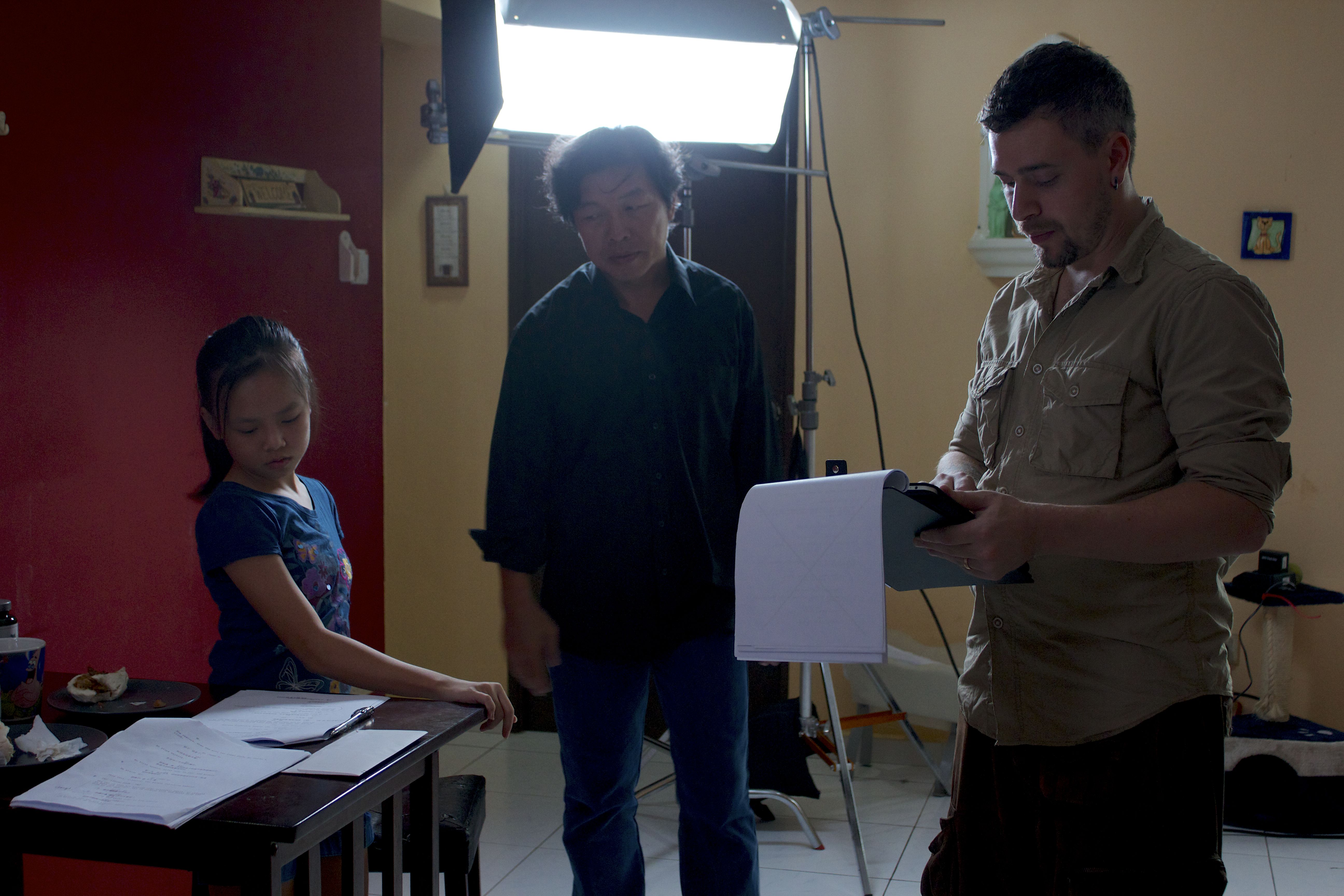 Shawn Sigler with Michael Chua and Kacie Tan on the set of 