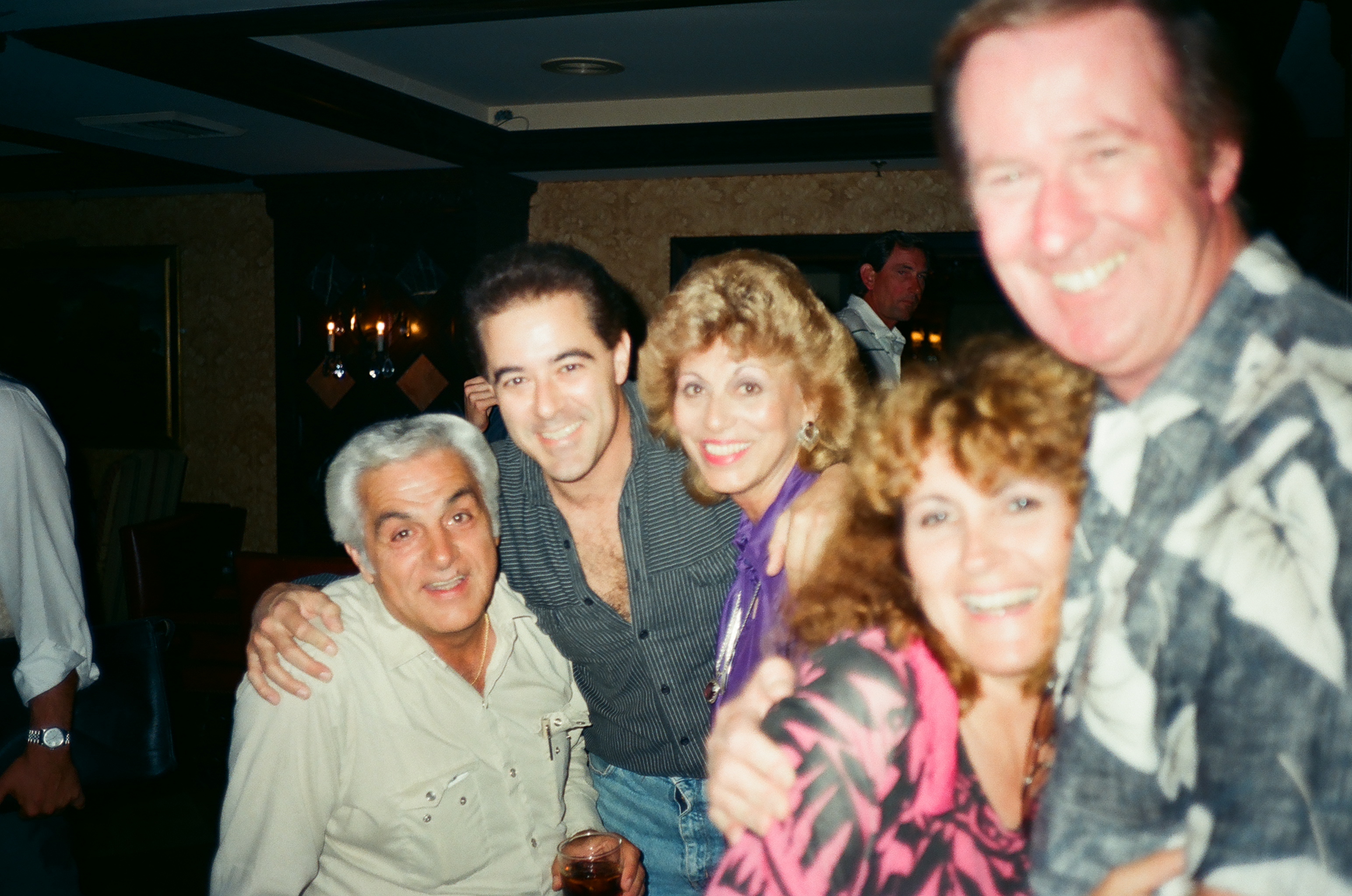 Arrive Alive 1990 wrap party Warren with the late Johnny Oliver and members of the crew.