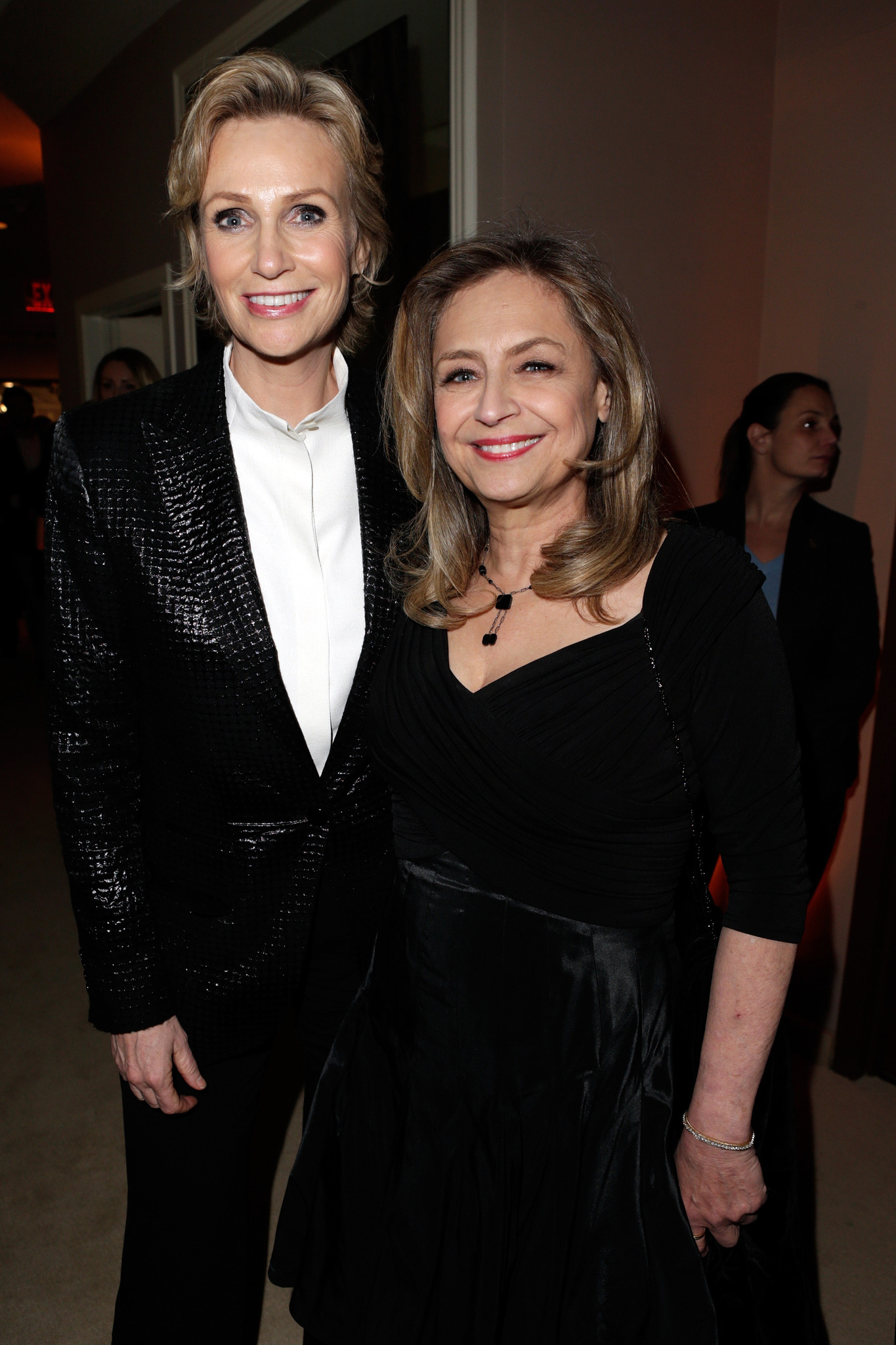 Jane Lynch (L) and Dr. Lara Embry attend the 2013 Vanity Fair Oscar Party hosted by Graydon Carter at Sunset Tower on February 24, 2013 in West Hollywood, California.