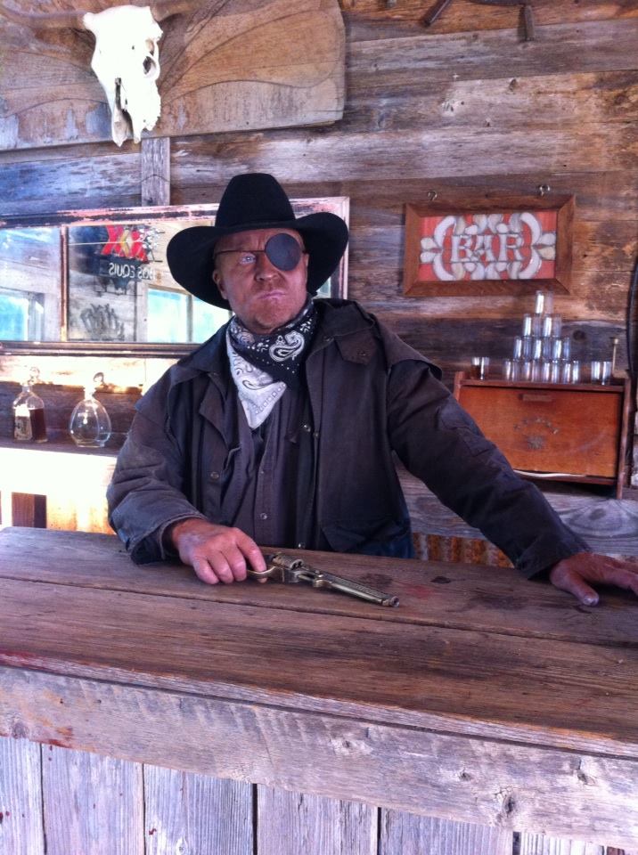 Kevin Kinkade as Shooter Revolver in 
