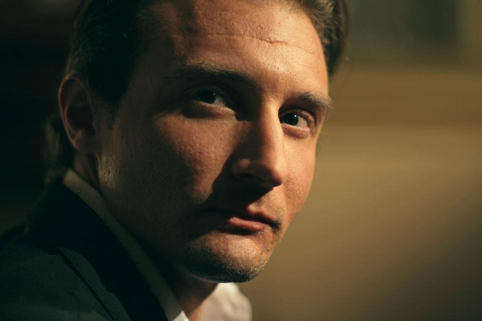 Al Vento portraying the role as businessman-gangster in a Noir short film, The Gadfly.