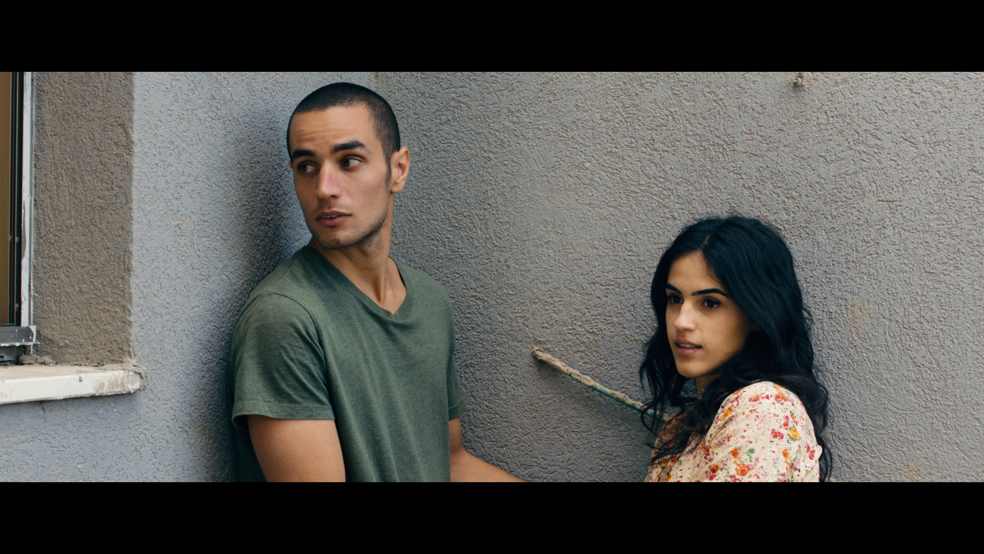 Still of Adam Bakri and Leem Lubany in Omaras (2013)