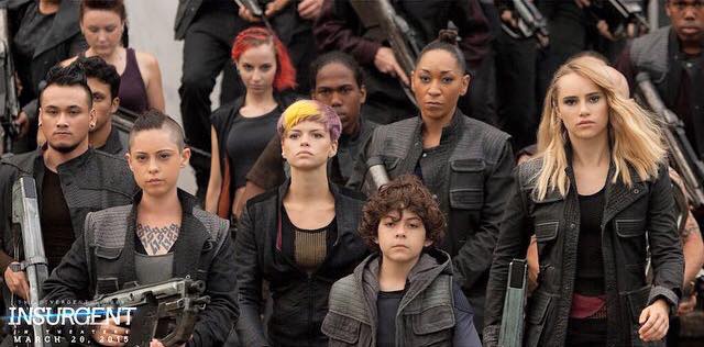 Still of Emma Elle Roberts, Rosa Salazar, Emjay Anthony, and Suki Waterhouse with the Dauntless Rebels for the film Insurgent.