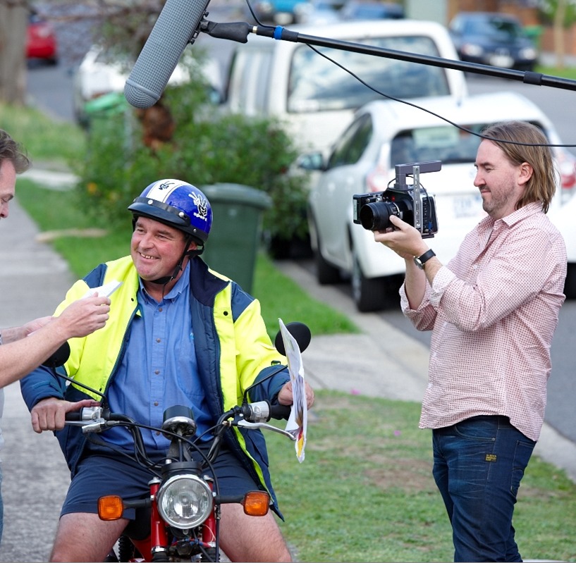 Aussie Bob the Postman delivering good and bad news.