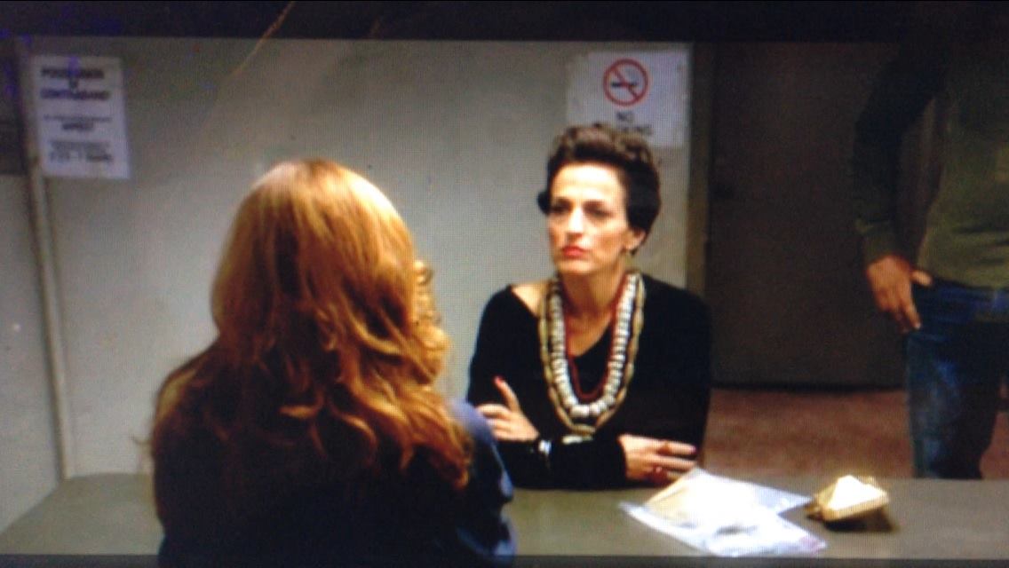 Me as Debra Messing in the interrogation room with Laz Alonso and the lovely lady you see in front of me.