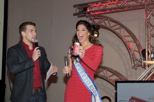 Hosting a product launch event. Joined on stage by Miss Universe Puerto Rico 2011, Viviana Ortiz
