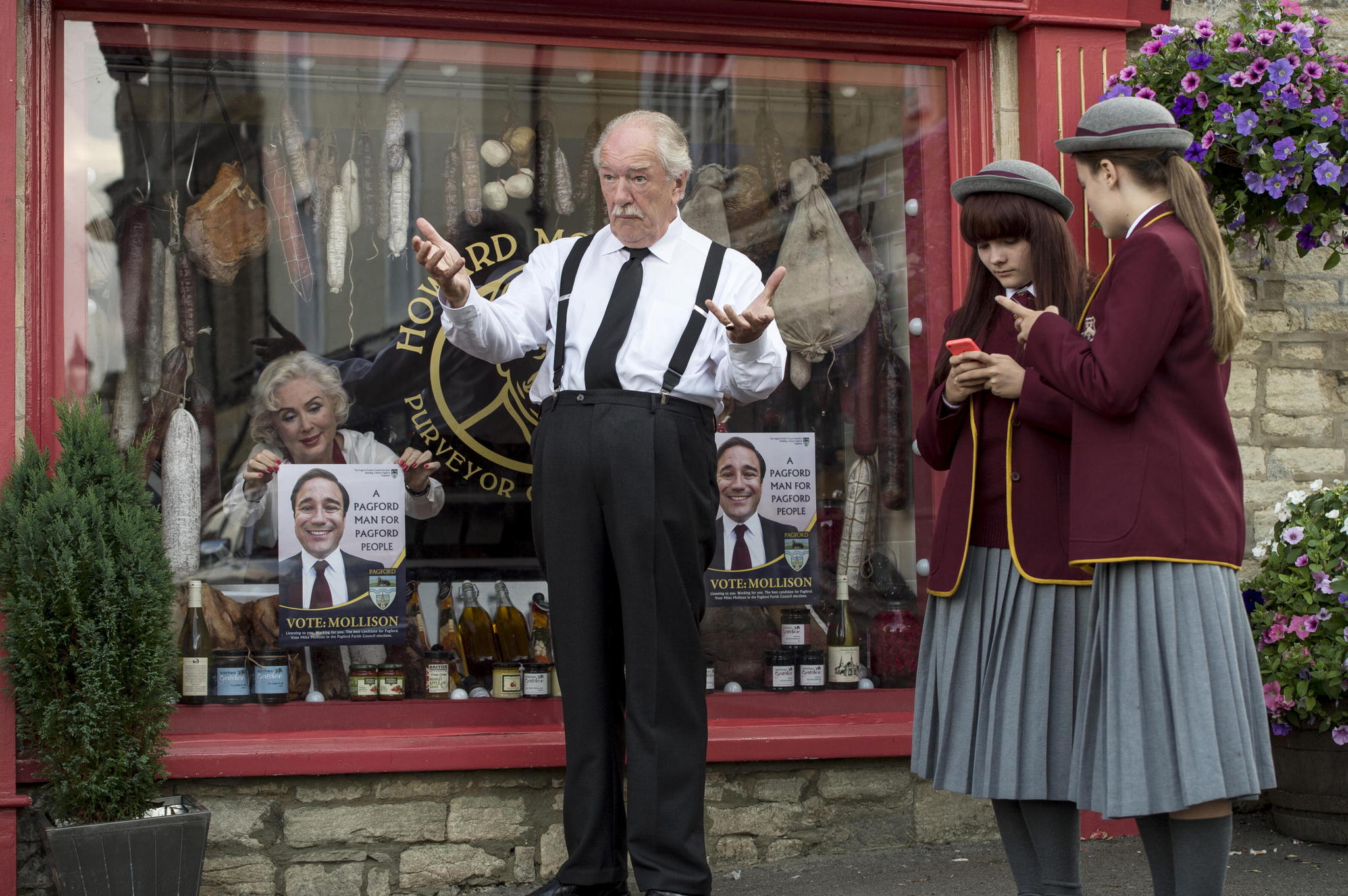 Still of Michael Gambon and Lauren Dowling in The Casual Vacancy (2015)