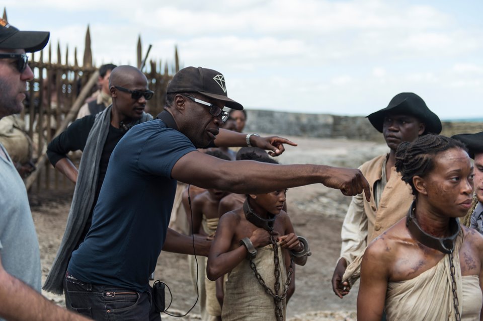 Shai Pierre-Dixon with Director Clement Virgo, on the set of 'The Book of Negroes'