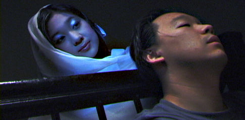 Phantom (Kathy Shao-Lin Lee) appears to Wing (Michael Kim)