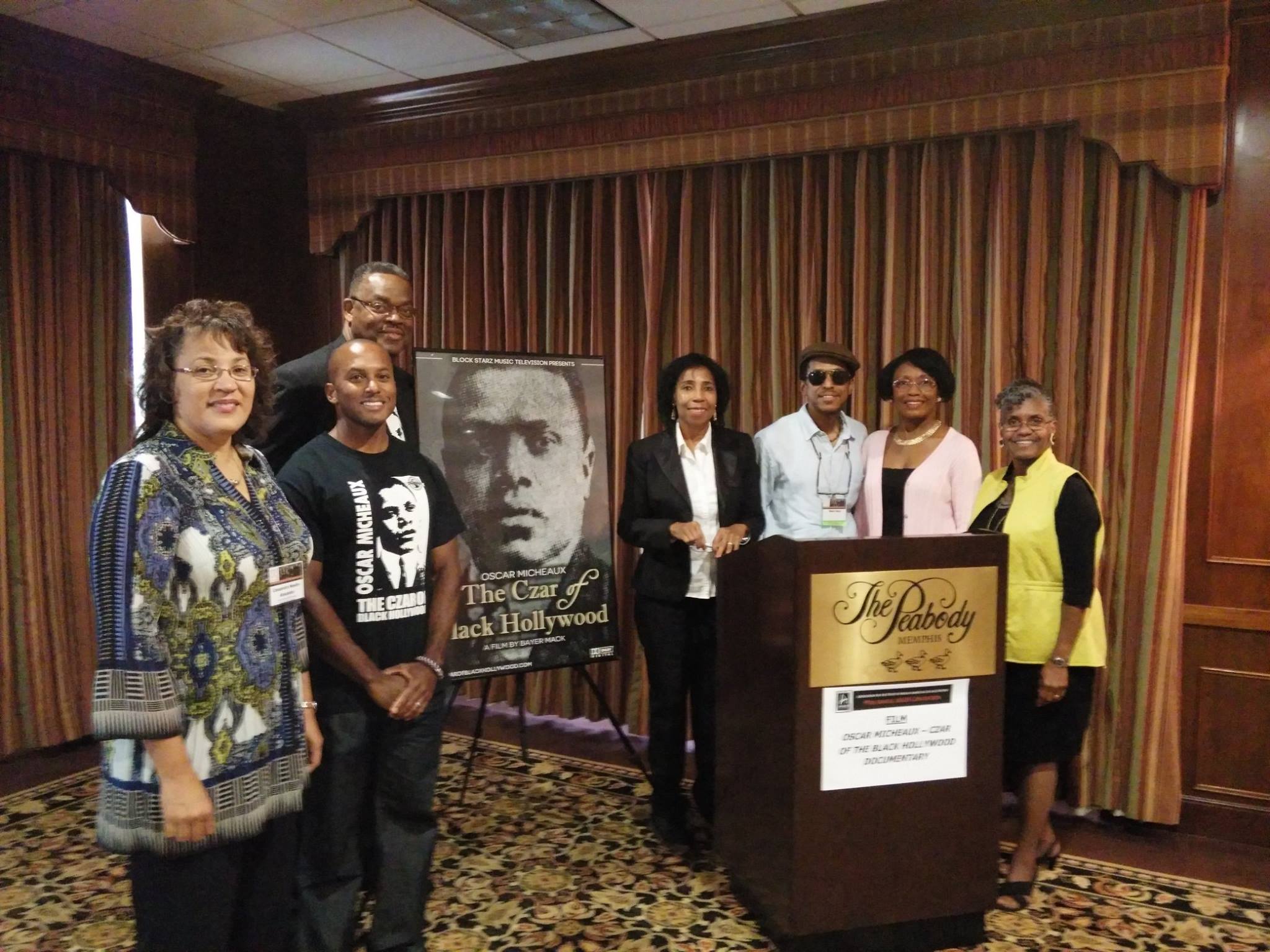 Oscar Micheaux: The Czar of Black Hollywood writer/director Bayer L. Mack at podium with executive producer Frances Presley Rice to his immediate left.