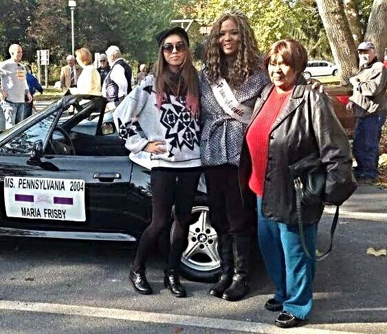 Ms. Pennsylvania 2004 Maria Frisby with fans during a photo-op.