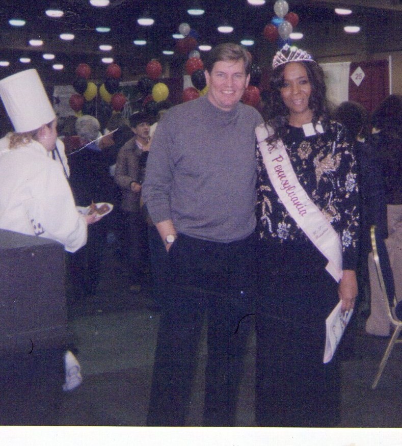 Ms. Pennsylvania 2004 Maria Frisby and WGAL TV 8's Weathercaster Doug Allen at the 2004 Chocolate Fest in Hershey, PA.