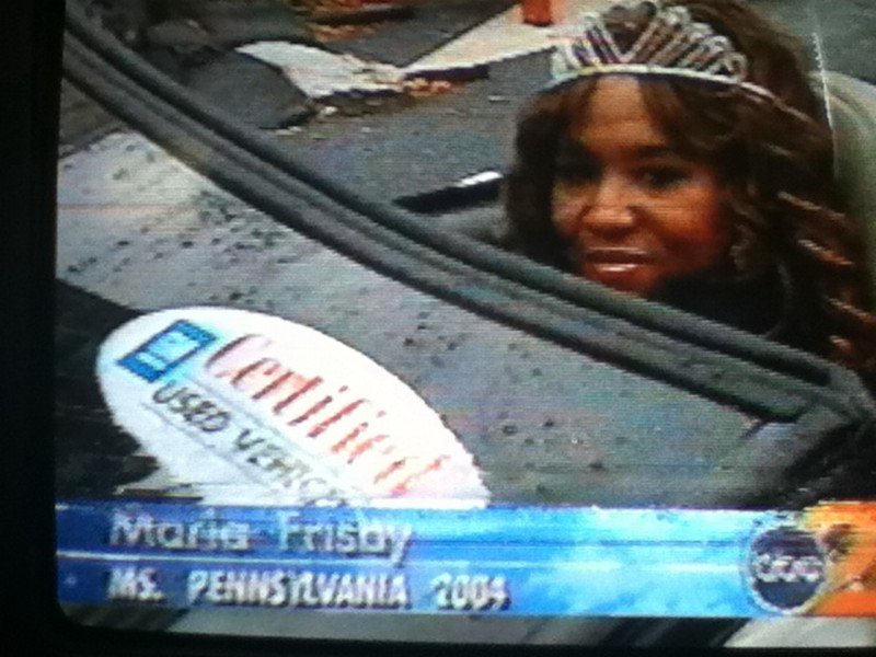 Ms. Pennsylvania 2004 Maria Frisby waving to fans and the tv audience at the 2004 Harrisburg Holiday Parade.