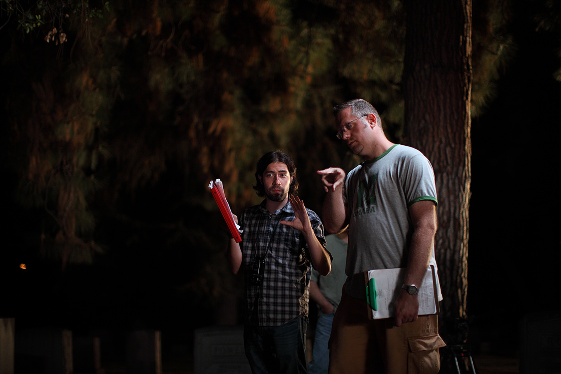 Miguel Muller discusses the next shot with AD Peter Paul Basler on location for the short film YOLANDA.
