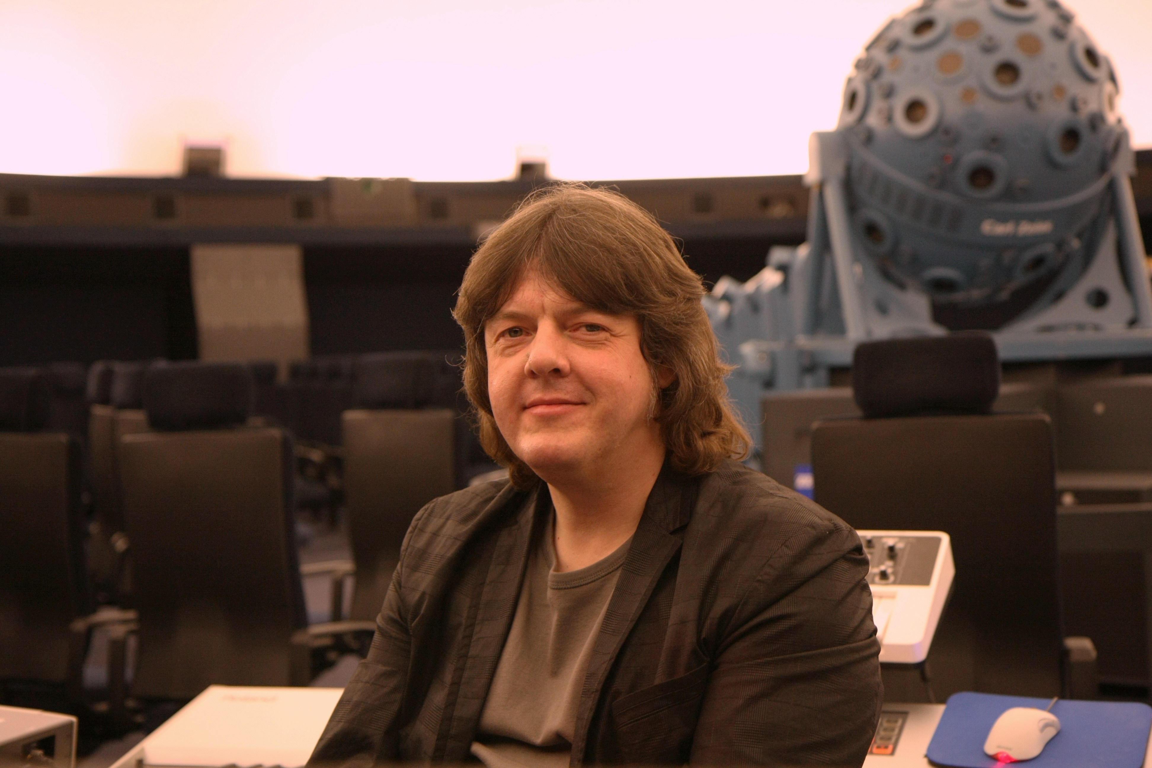 Bernd Kistenmacher. Composer. Musician. Shot taken during a concert at planetarium Muenster (Germany) , 2012.