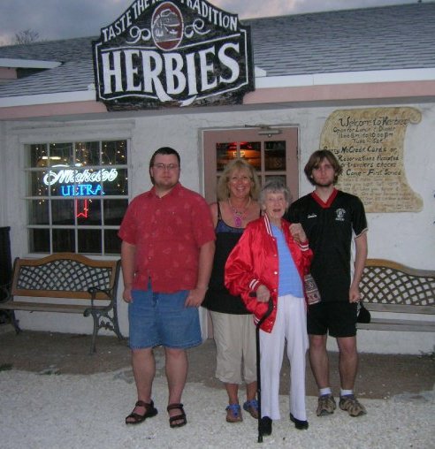 Shell Walker-Cook, Giles Cook, Charles B. Cook III, and Genevieve Walker of Tuff Cat LLC on location at Bloodline, Upper Keys, Florida.