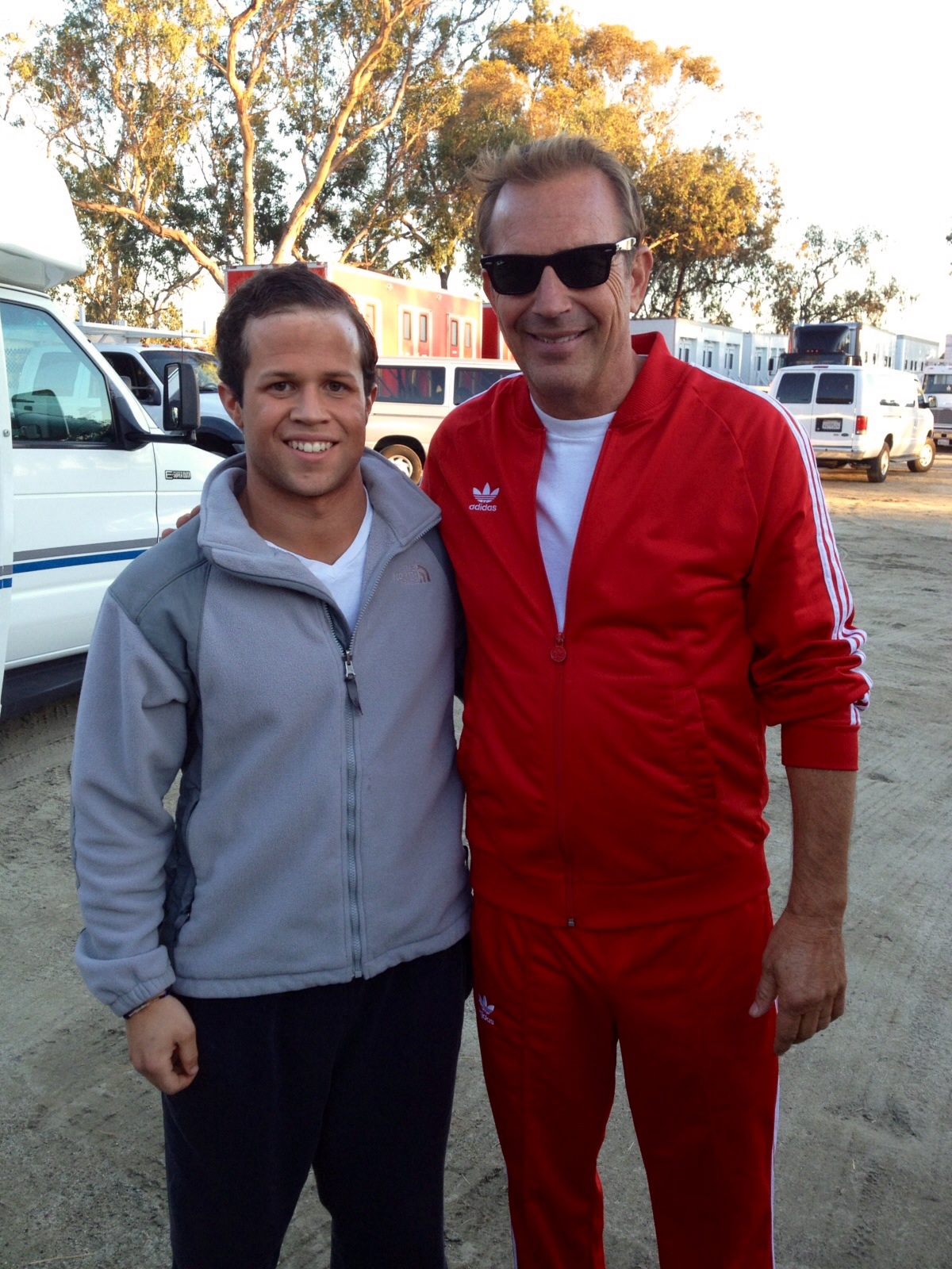 Jesse Lorenzo and Kevin Costner on the set of McFarland USA