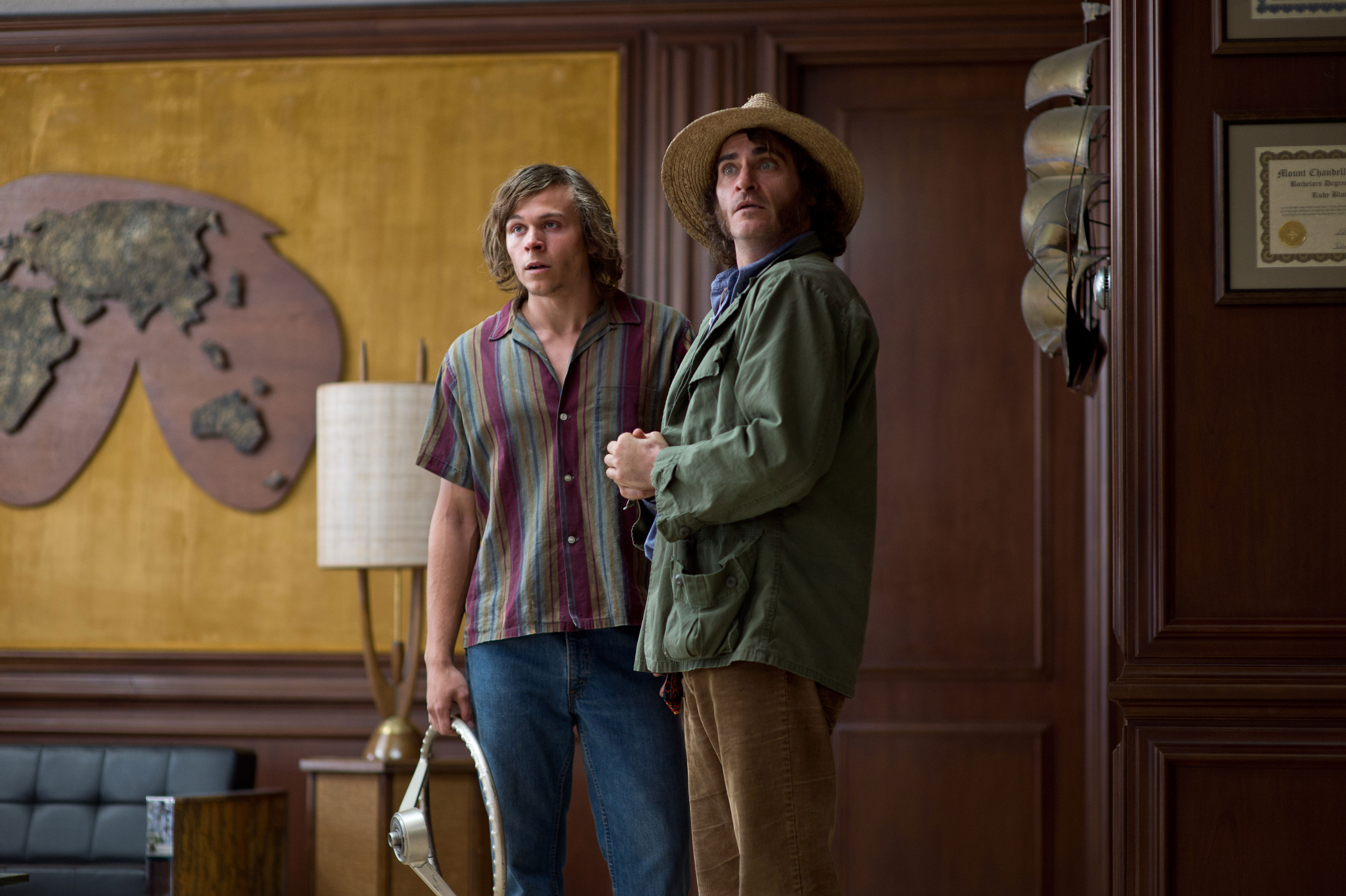 Still of Jordan Christian Hearn and Joaquin Phoenix in Inherent Vice