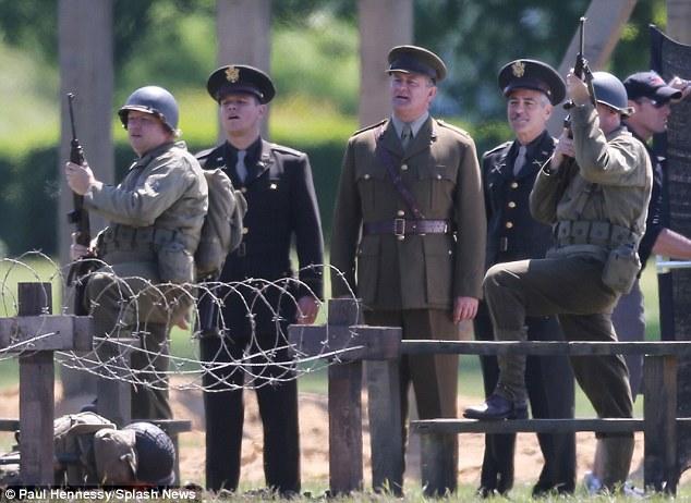 Monuments Men (as US Corporal) L-R Robert Eames,Matt Damon, Hugh Bonneville, George Clooney