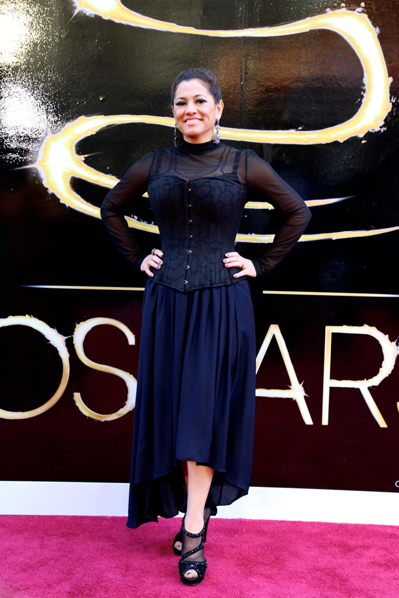 On the red carpet at the 85th Academy Awards.