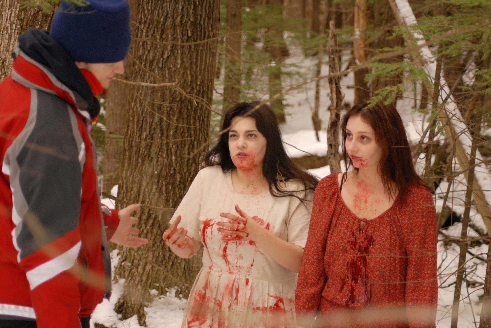 Director Andrew Migliori, with Kendra White and Lizzie Stanton filming The Donner Party on location in New Hampshire