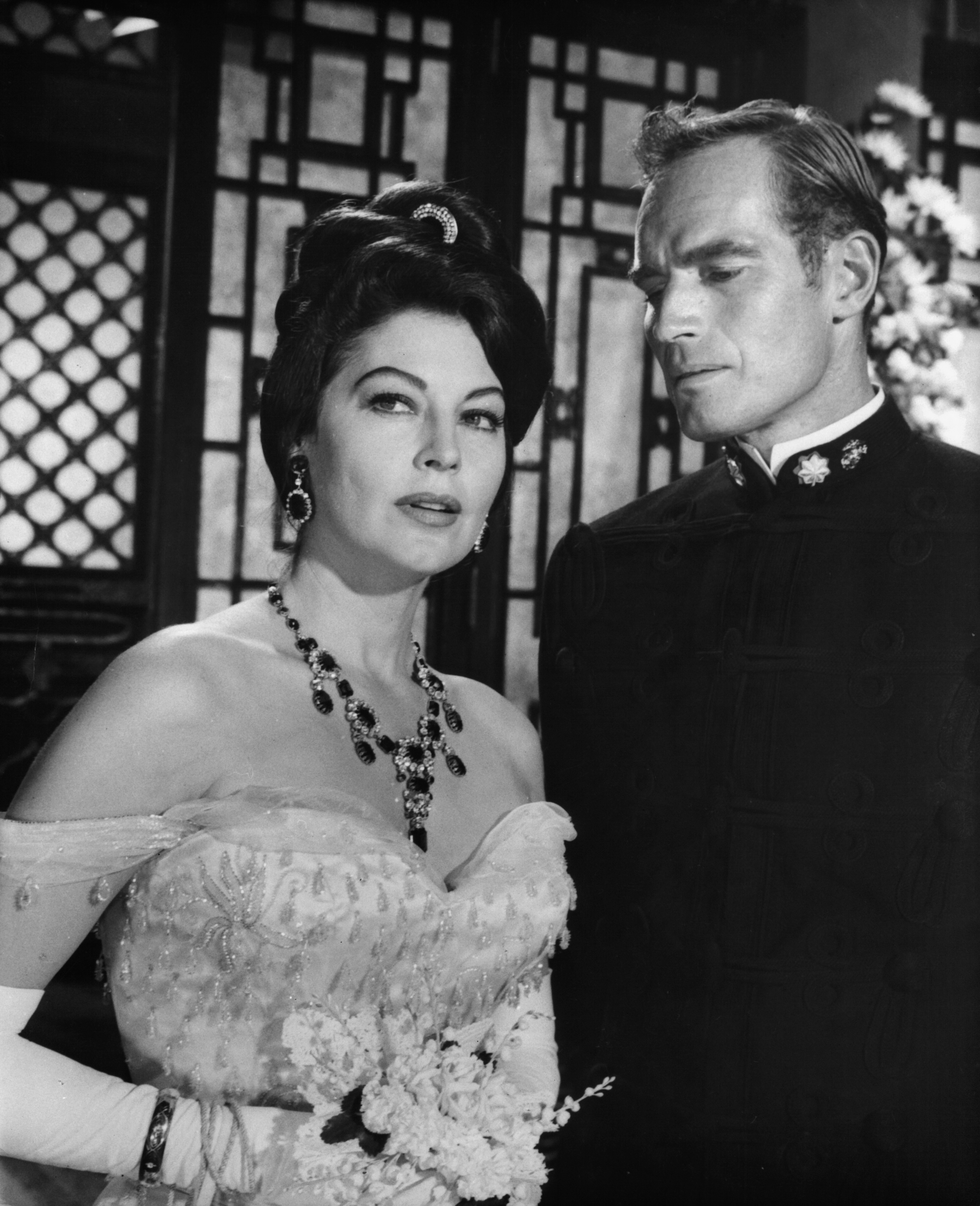 Still of Charlton Heston and Ava Gardner in 55 Days at Peking (1963)