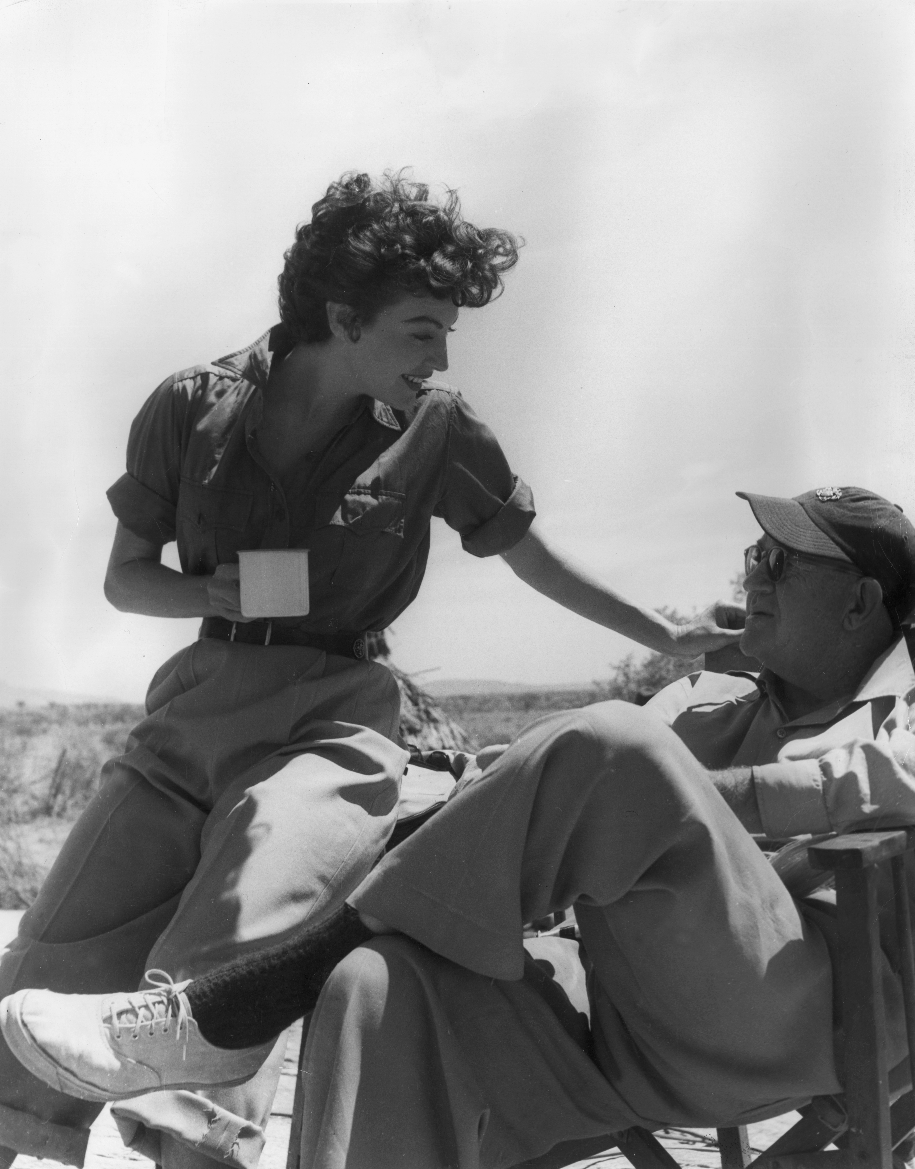 Still of John Ford and Ava Gardner in Mogambo (1953)