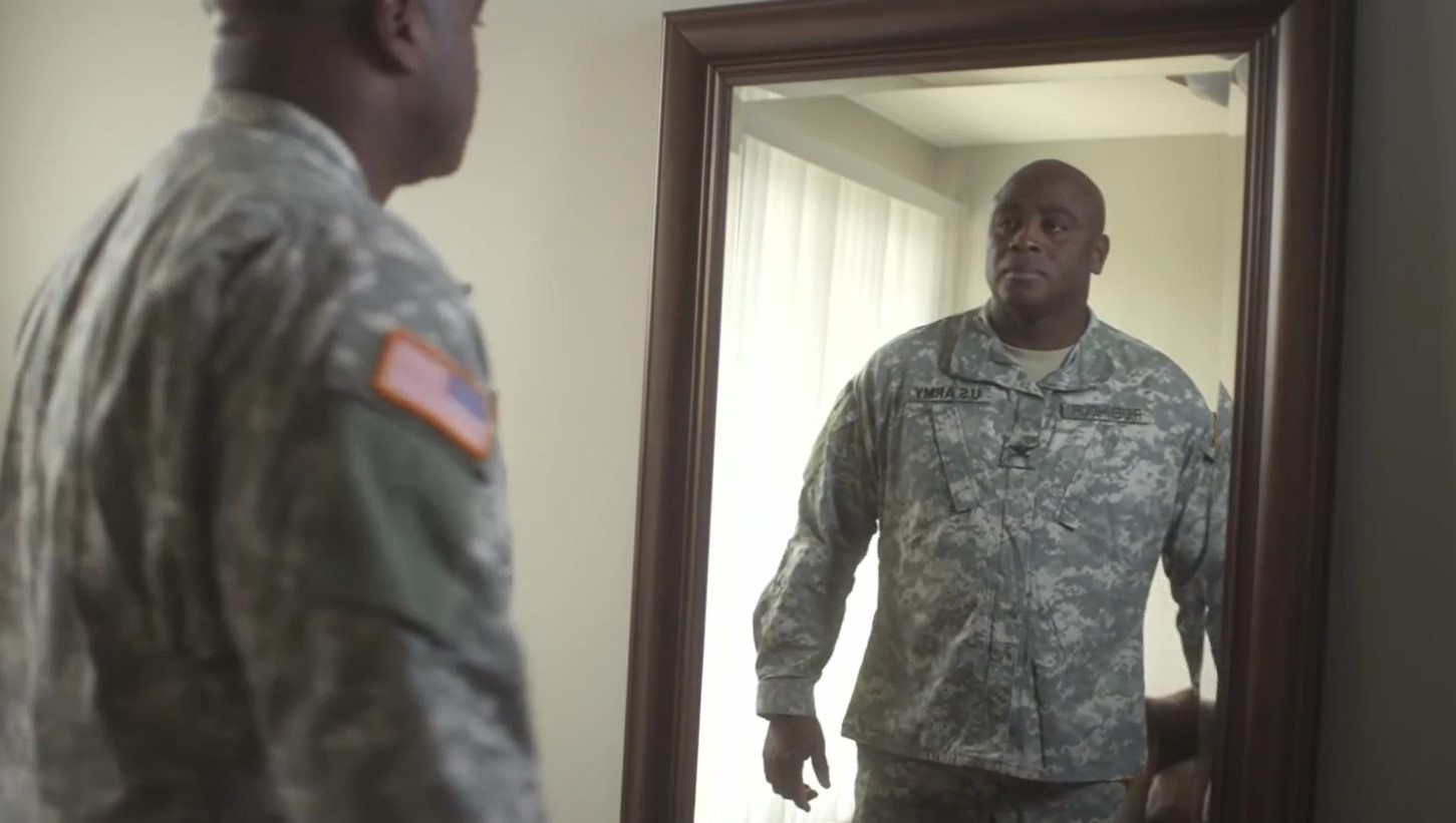 Still of Tommy Brown portraying the role of an Army Colonel in a U.S. Army SHARP PSA in the military. The video aired December 2013.