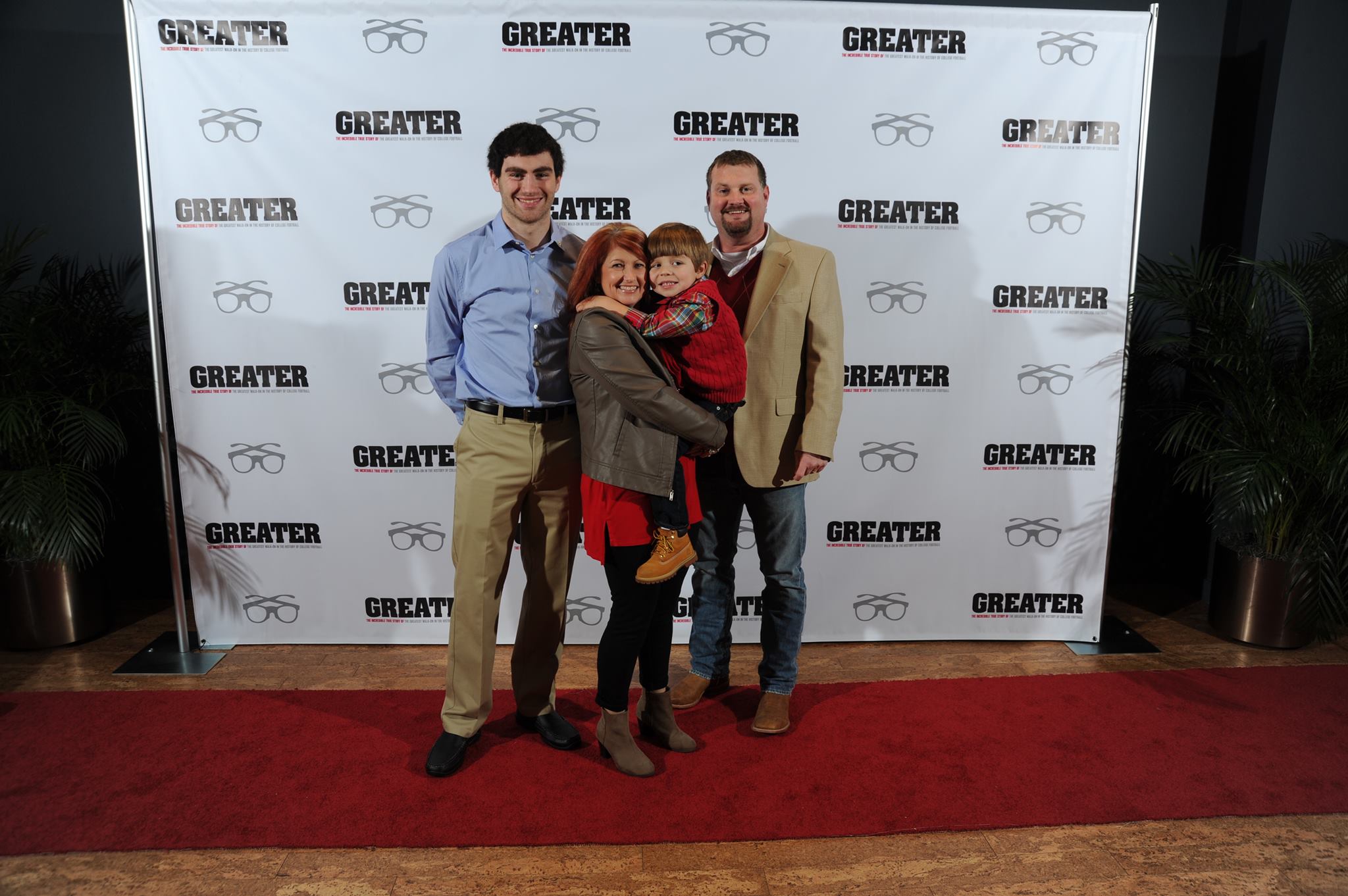 Spencer Rohrscheib, with his parents Cotton & Donna Rohrscheib, alongside Aaron Burlsworth (the character he played in the movie 'GREATER')