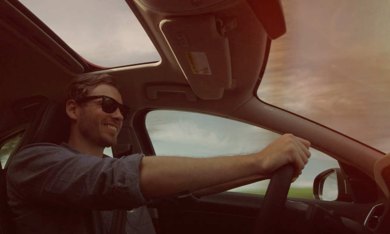 Still from VOLVO S60 ROAD TRIP commercial. Precision Driver Mads Black.