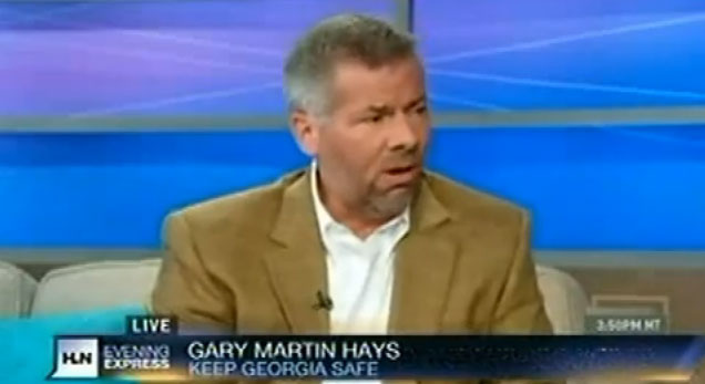 Gary Martin Hays appearing on CNN's Headline News Evening Express.