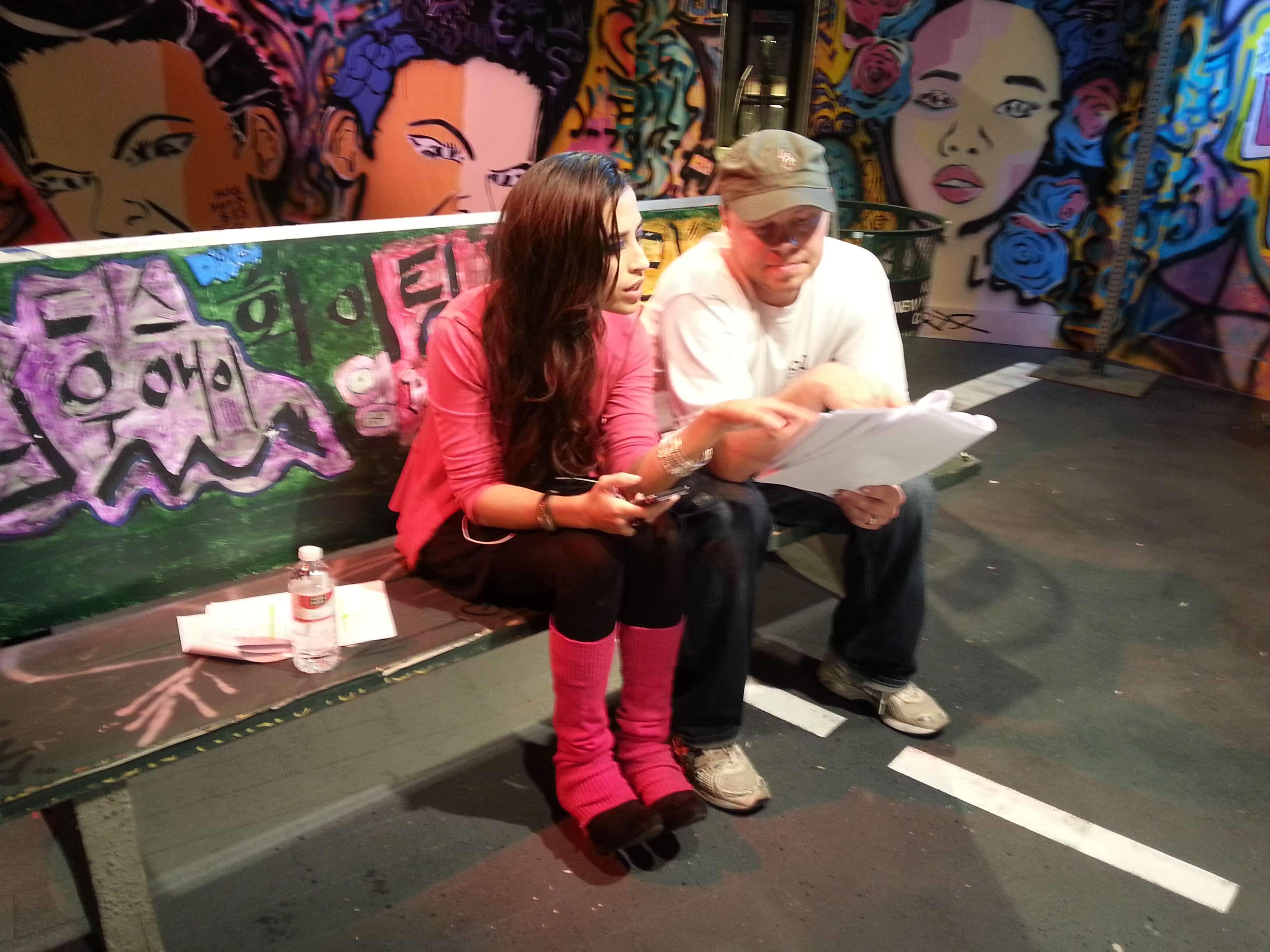 Actress Briana Baron and Jon Smith on set.