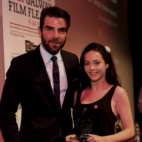 Kelly being presented the Bingham Ray New Talent Award by Zachary Quinto