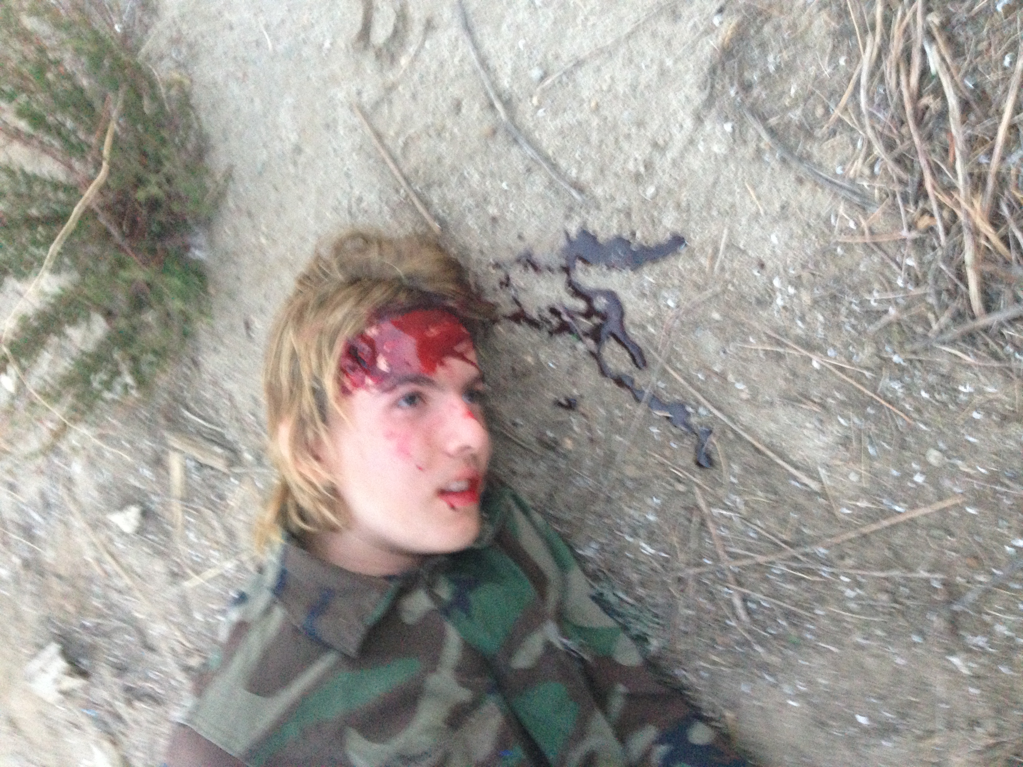 Photo from the set of Soldier. Directed by Jenna Bryant. Scene: Adam shot dead.