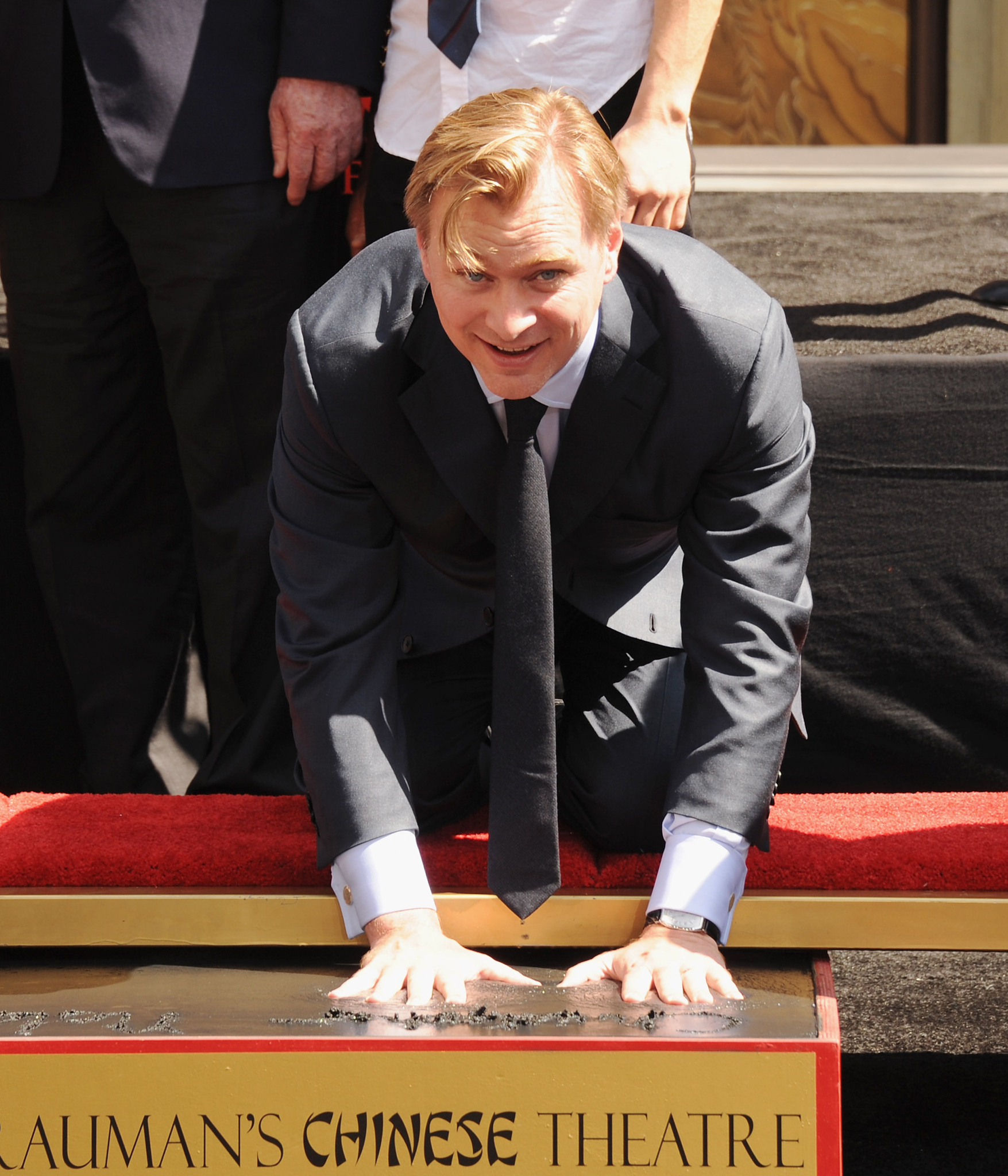 Director Christopher Nolan poses at the Christopher Nolan Handpirint Ceremony at Grauman's Chinese Theatre on July 7, 2012 in Hollywood, California.