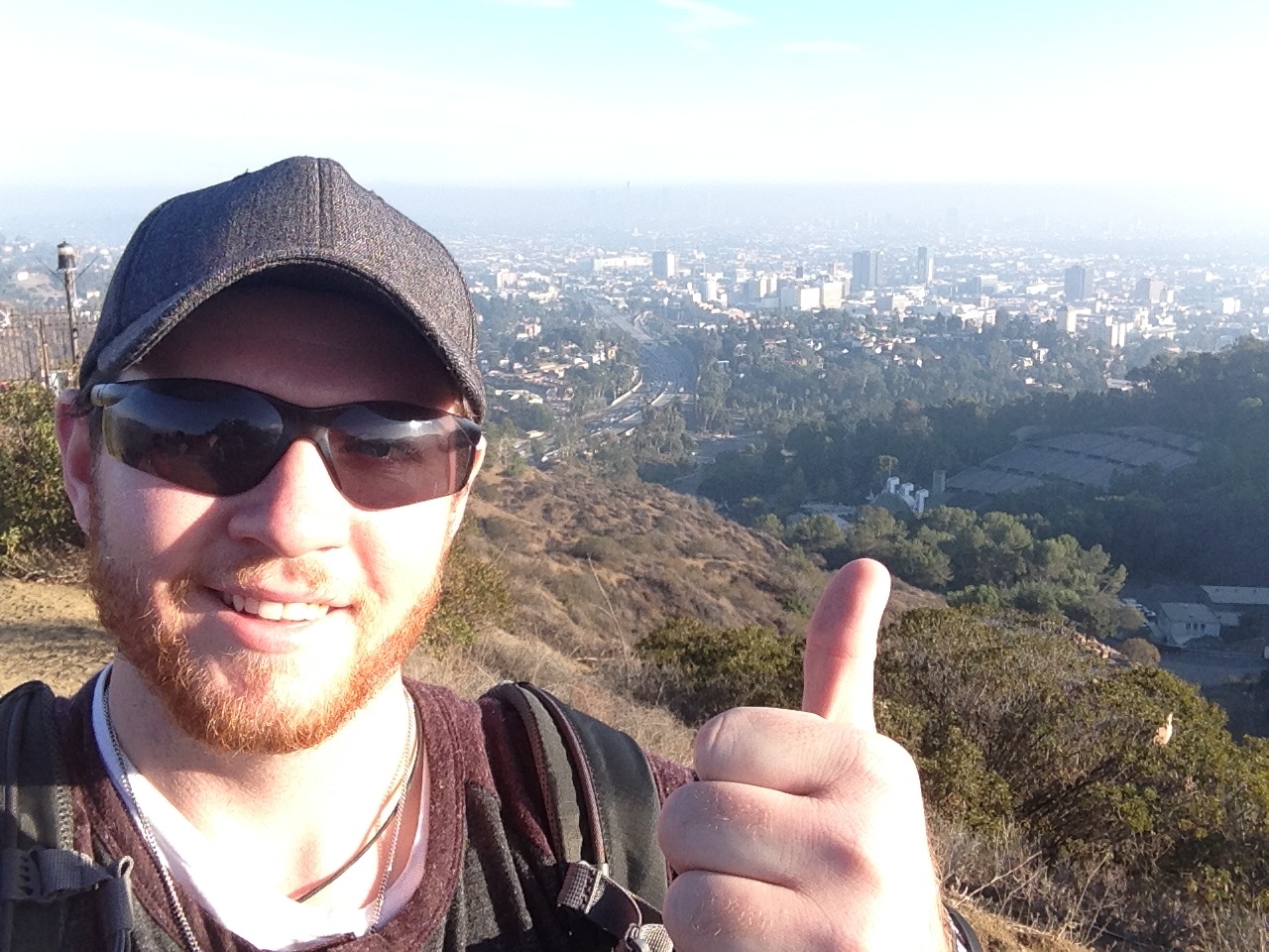 Zack over looking the city on top of the Hollywood sign
