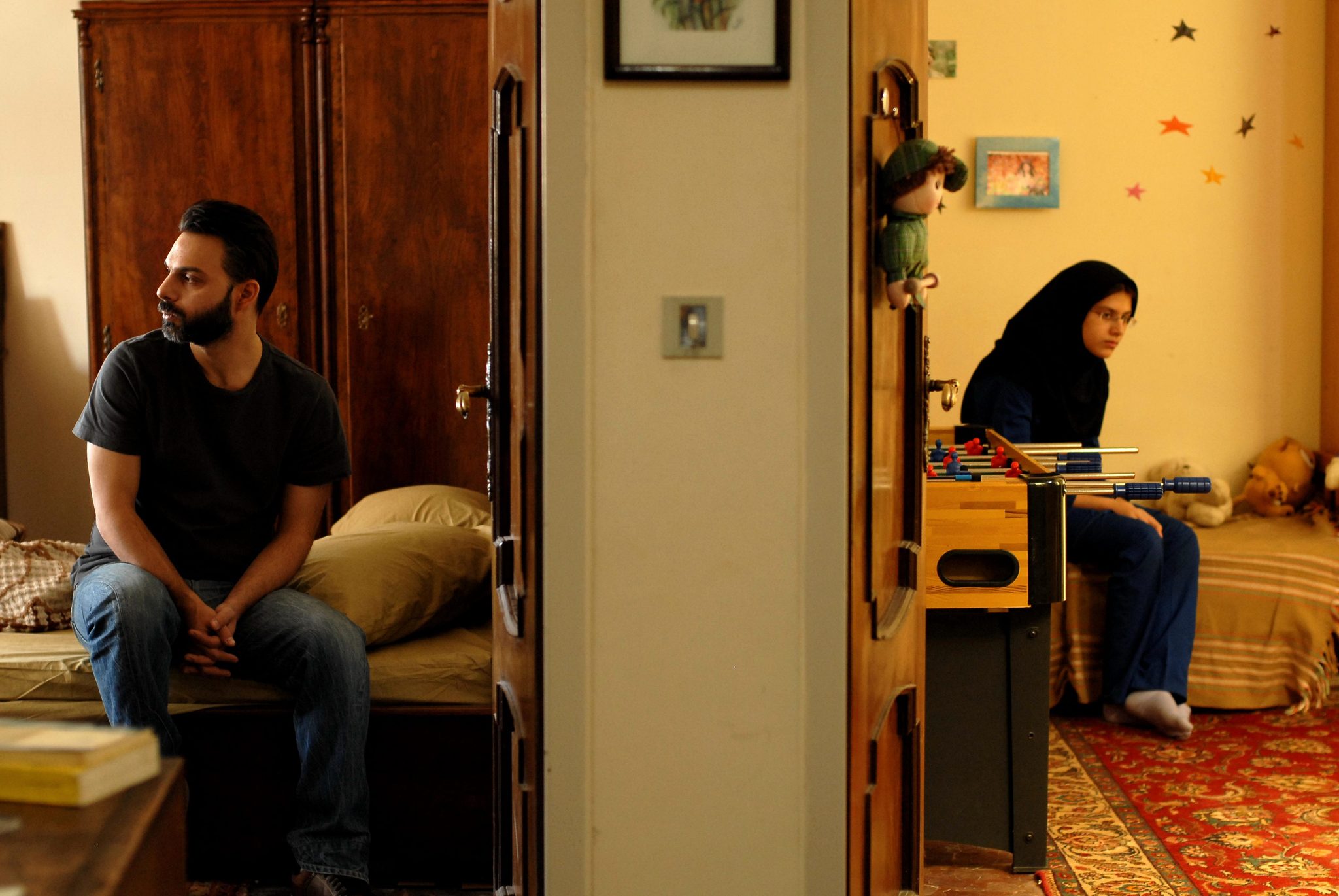 Still of Peyman Moaadi and Sarina Farhadi in Issiskyrimas (2011)