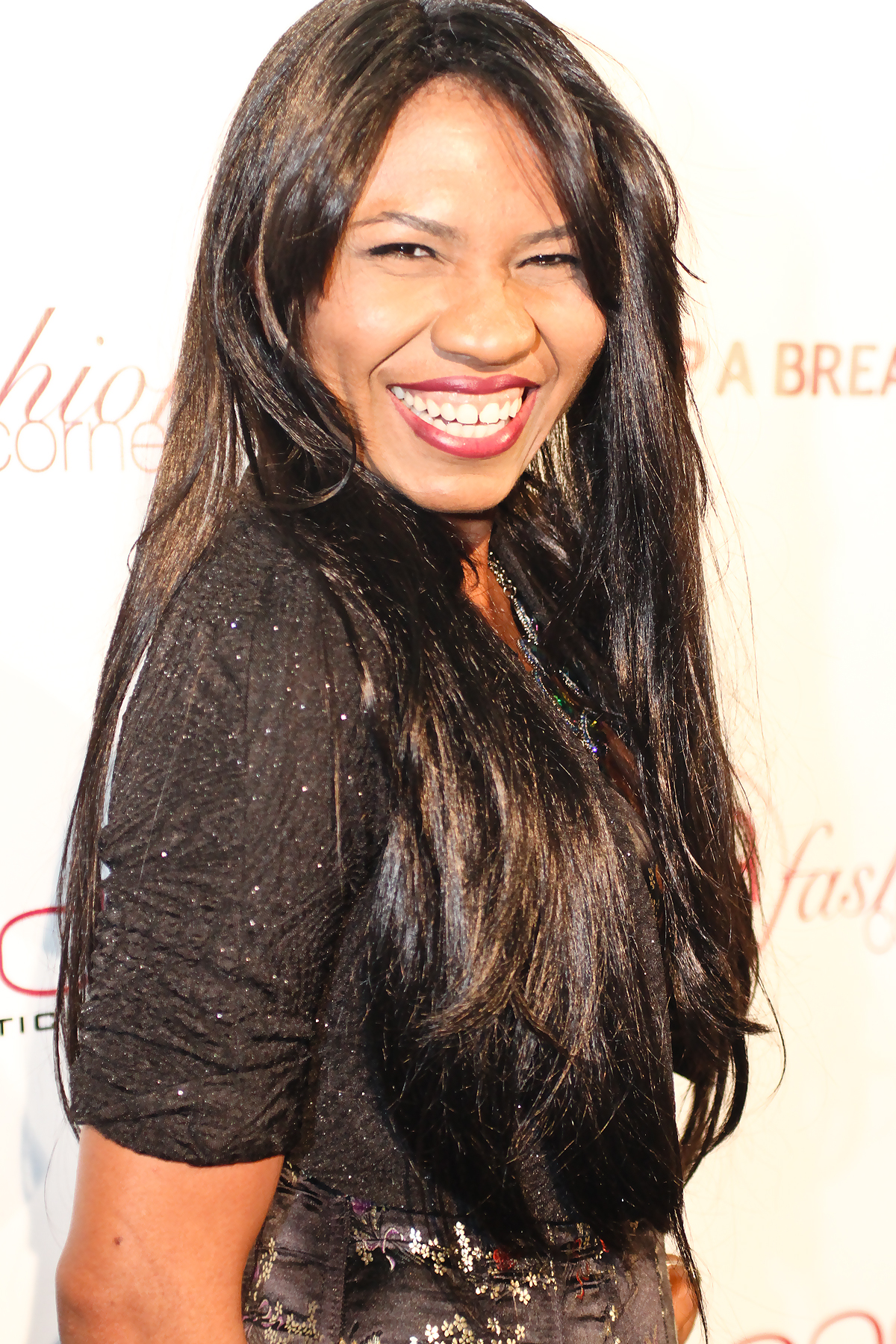 Olympia LePoint on the Pink Carpet at the LA Fashion Corner Celebrity Fashion Show Benefiting Breast Cancer Awareness