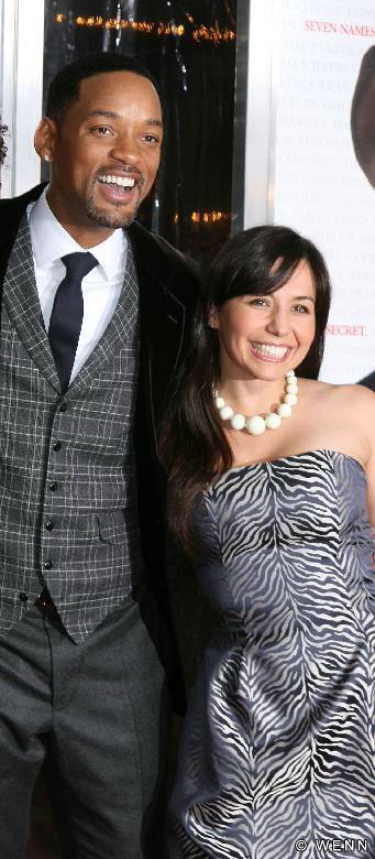 Yeniffer Behrens and Will Smith on the red carpet at the world premiere of 7 Pounds.