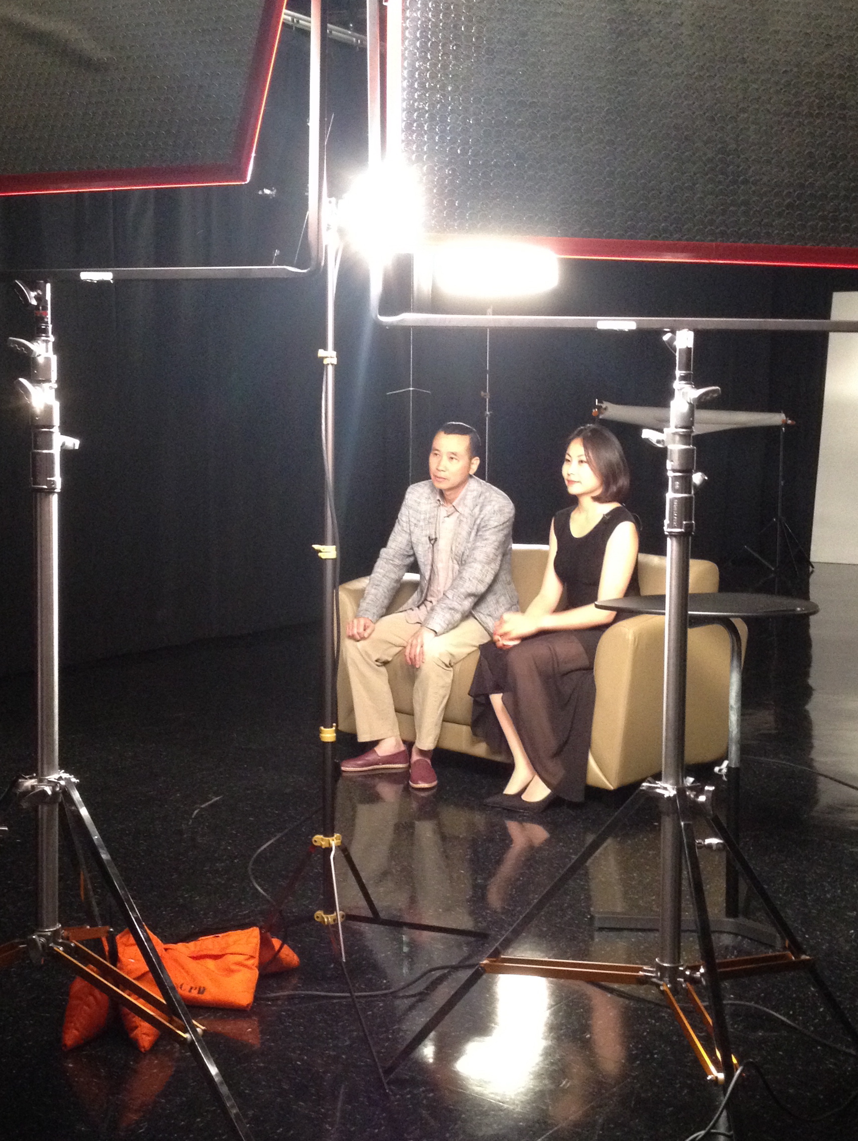 Ho Yi with leading lady Joy Ya at CBS studios, being interviewed