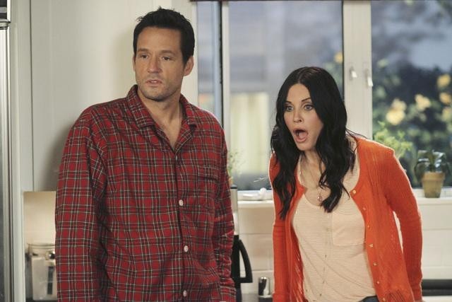 Still of Courteney Cox and Josh Hopkins in Cougar Town (2009)