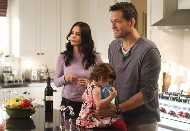 Still of Courteney Cox and Josh Hopkins in Cougar Town (2009)