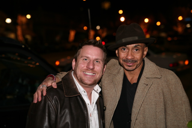 Ty (right) celebrates the premiere book signing of the acclaimed photo journal 