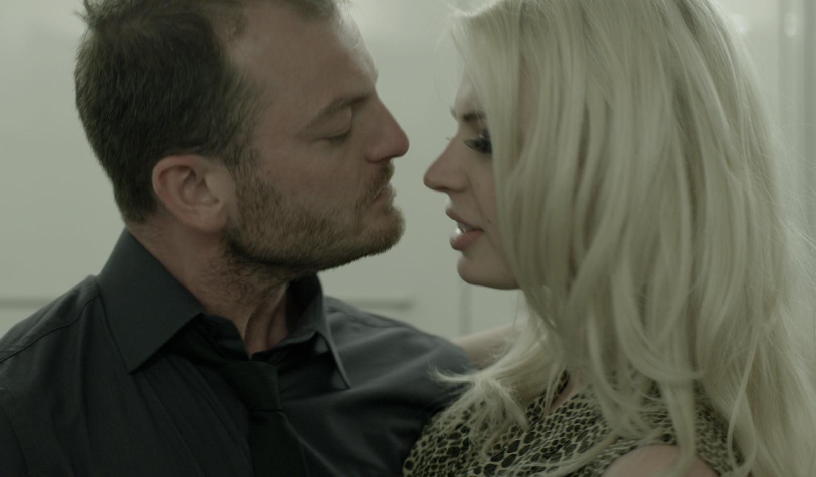 Chloe Farnworth and Maxim Wrottesley. Still from feature film Dirty Money.