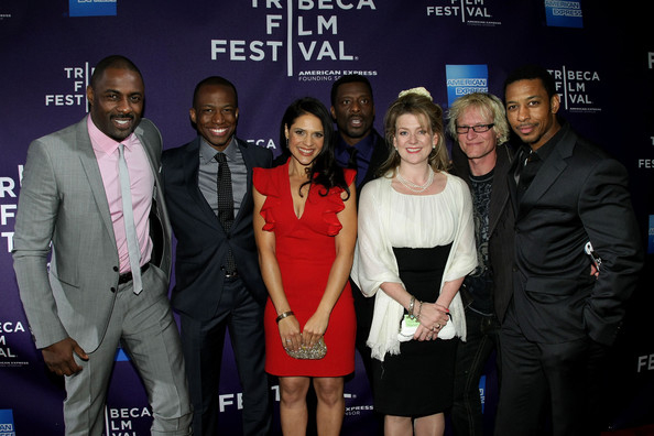 (L-R) Actor Idris Elba, director Thomas Ikimi, actress Monique Gabriela Curnen, actor Eamonn Walker, producer Arabella Page Croft, composer Mark Kilian and actor attends the premiere Of 