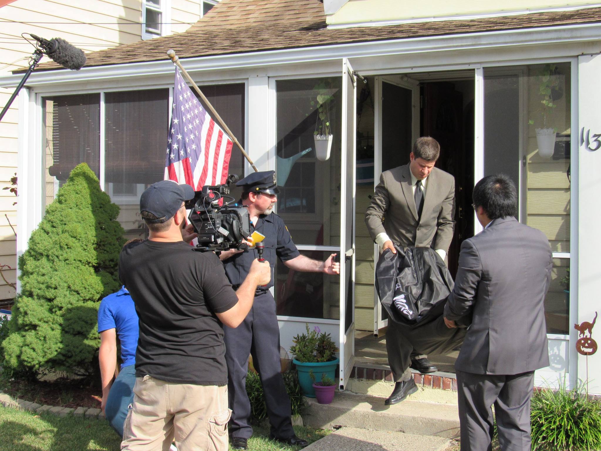 Part of a chilling scene (as Policeman #3, holding the door) in Black Wake