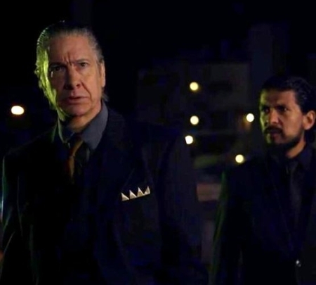 Richárd Bernard as Mafia Boss, with Anton Rivas.