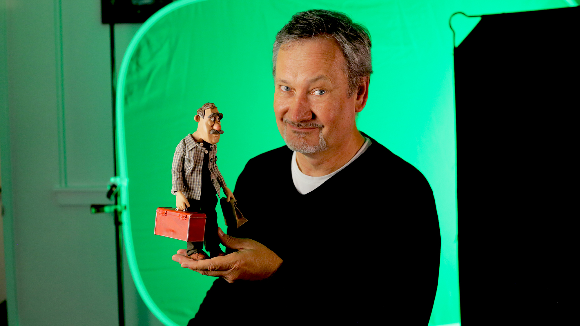 Jon V. Peters with one of the stop-motion puppets from Athena Studios.
